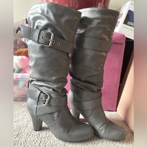 Target brand size 8, grey in color ladie boots. 3 inch heel and 16 inch high